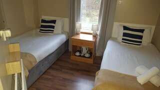 Гостевой дом Portfinn Lodge Линон Бюджетный двухместный номер с 2 отдельными кроватями-3