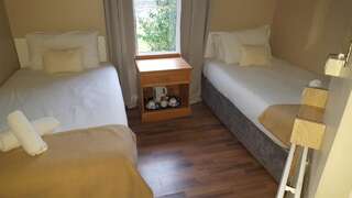 Гостевой дом Portfinn Lodge Линон Бюджетный двухместный номер с 2 отдельными кроватями-4